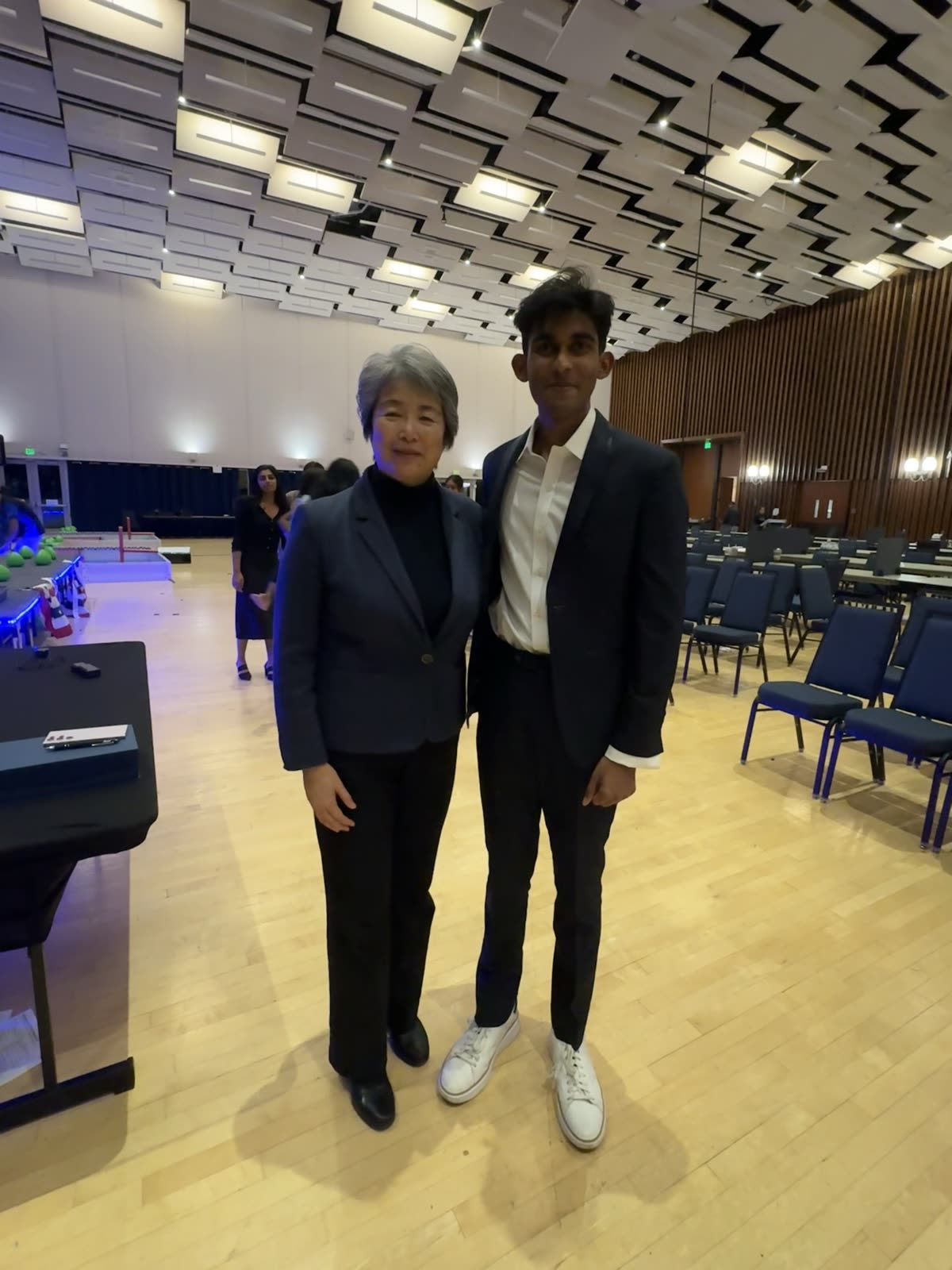 Arya Sasikumar standing with Dean Tsu-Jae King Liu after the closing ceremony