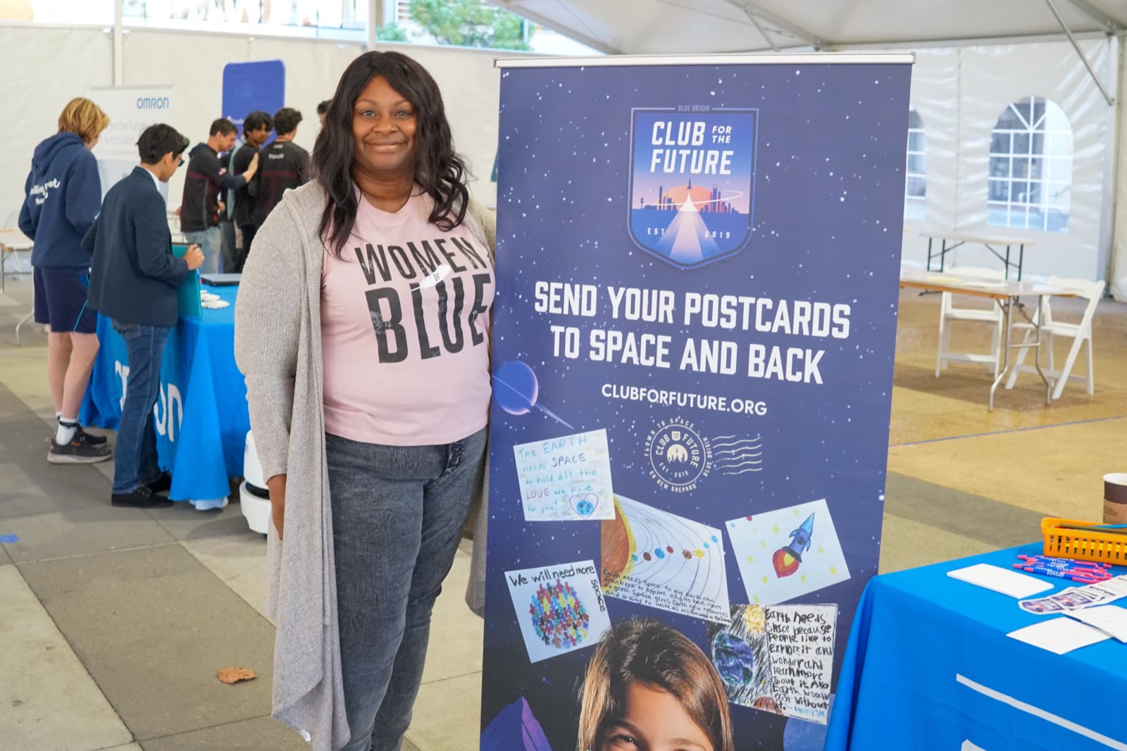 Club for the Future booth inviting students to send postcards to space