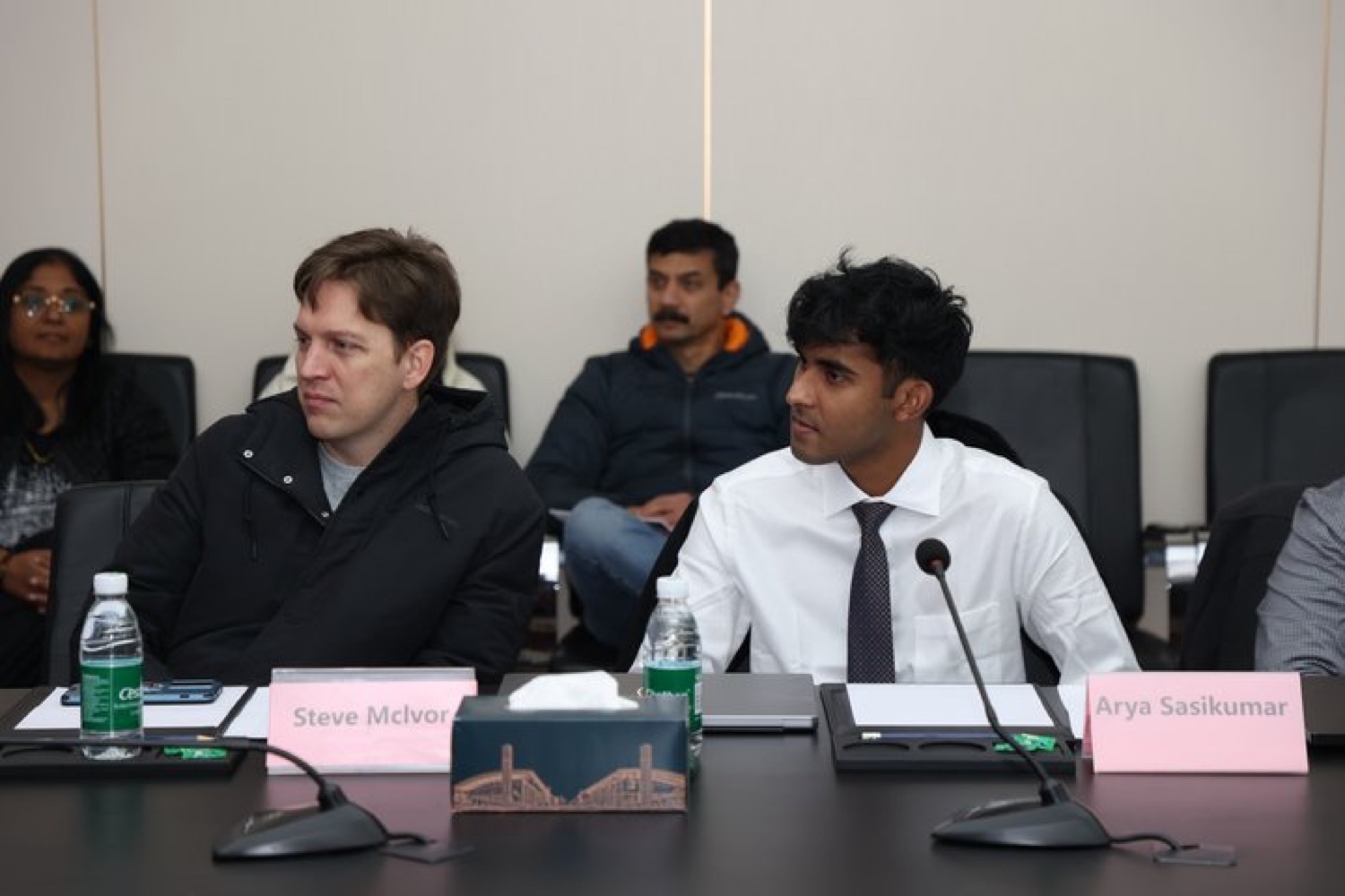 At the table during the exchange